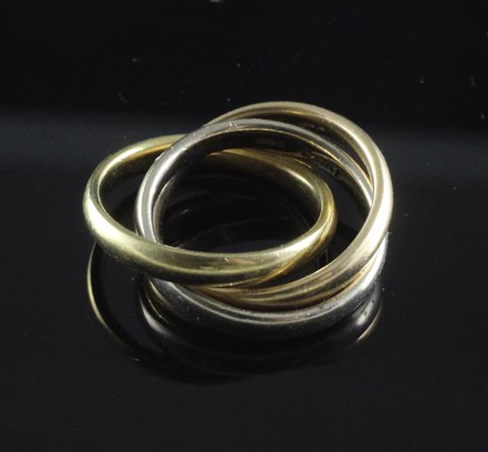 A 1990s three colour 18ct gold triple band Russian Wedding ring, size F.